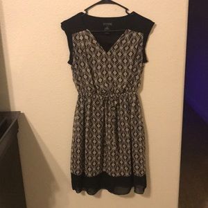 Black and beige dress.